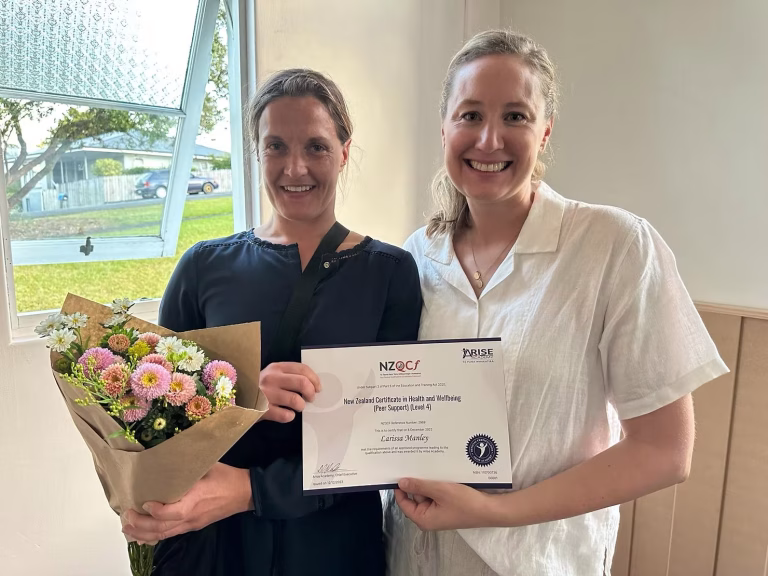 Larissa with Jos Fox holding her certificate